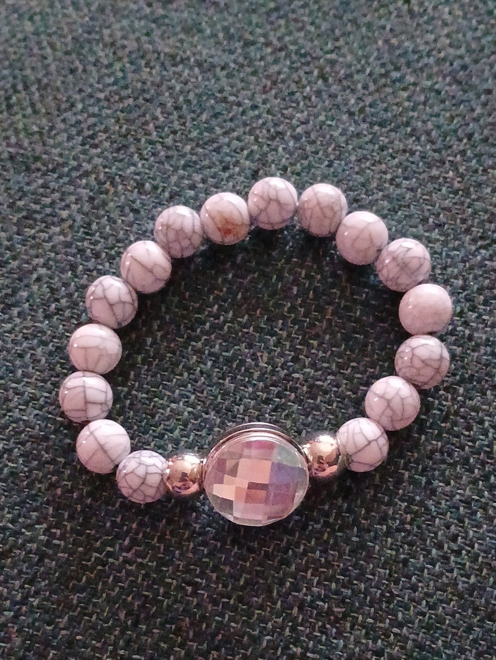 White Marble Bead Stretch Bracelet with Faceted Center Stone
